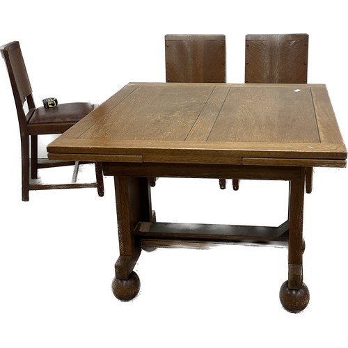 393 - Oak draw leaf  table and four chairs overall approximate measurements when extended 60 inches wide x... 