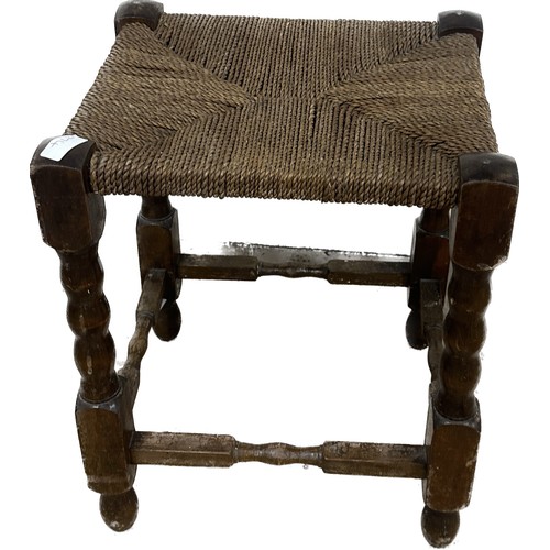 365 - Antique oak and straw stool measures approximately 18 inches tall x 15 wide and 12.5 deep