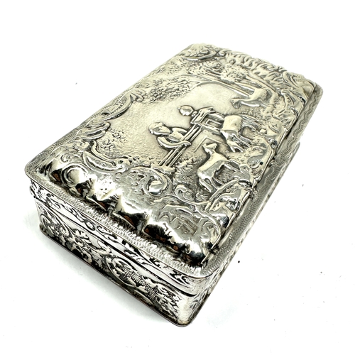 18 - antique silver embossed snuff box measures approx 7.5cm by 4.5cm