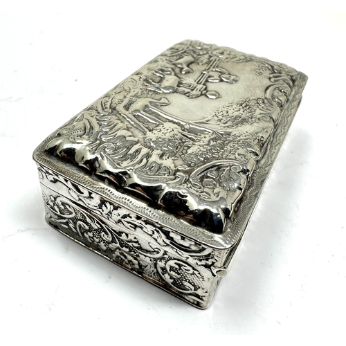 18 - antique silver embossed snuff box measures approx 7.5cm by 4.5cm