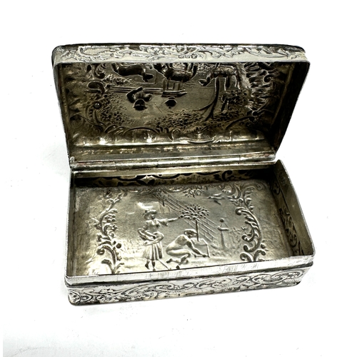 18 - antique silver embossed snuff box measures approx 7.5cm by 4.5cm