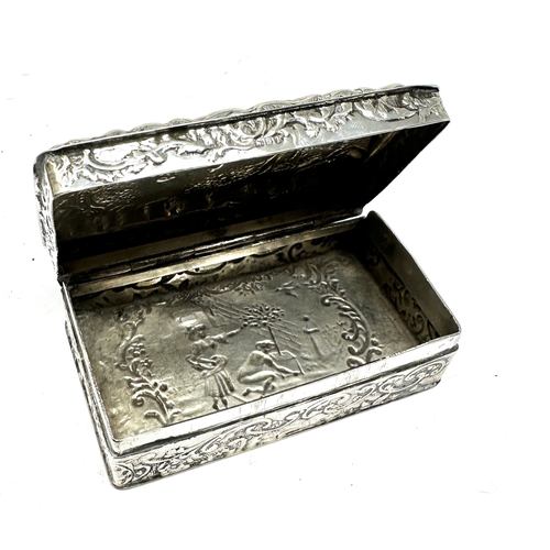 18 - antique silver embossed snuff box measures approx 7.5cm by 4.5cm