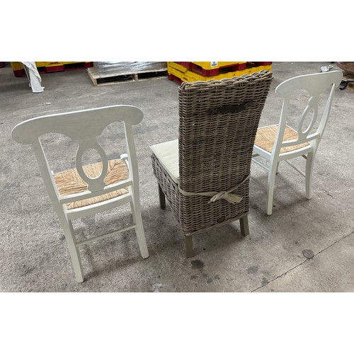 379 - Two straw seat chairs and a wicker chair with cushion