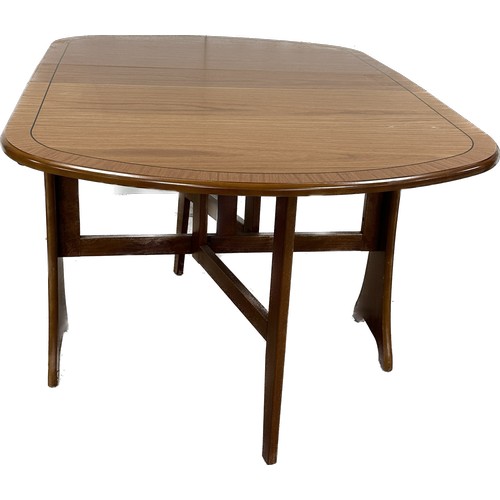 374A - Drop leaf table measures approximately when extended 29 inches tall x 54 wide and 35 deep