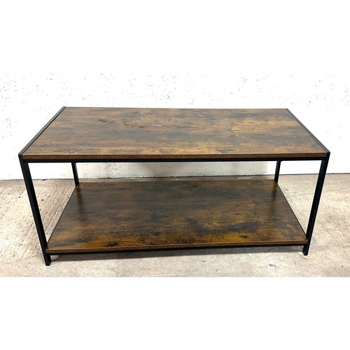 341 - Industrial looking wood and metal coffee table measures approximately 39 inches wide by 18 tall and ... 