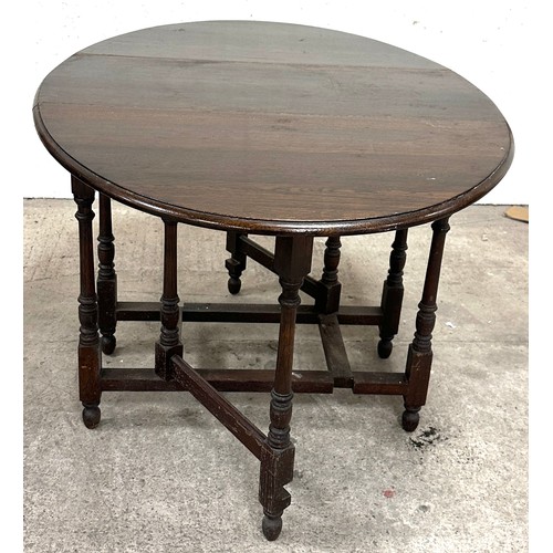 347 - Oak gate leg table measures when extended 30 inches tall x 53 wide and 90 deep