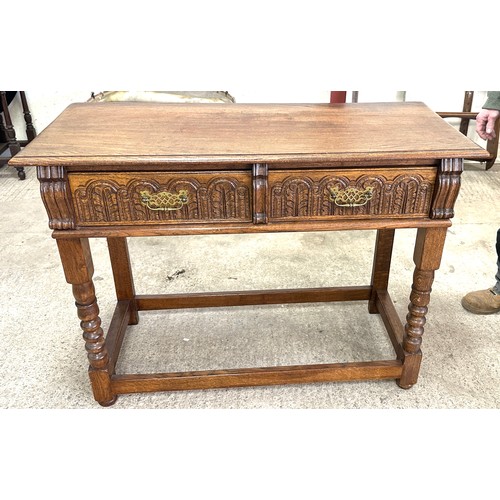 371 - Oak two drawer brass handled hall table measures approximately 32 inches tall x 43 wide and 18 deep