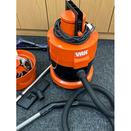 242 - Russel hobbs turbo vac pro with charger and a Vax 2286087 model 121, with accessories, working order