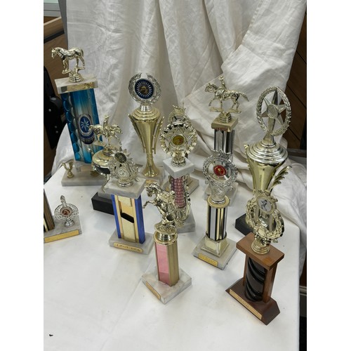 263 - Large selection of assorted Jockey/ cow boy trophies approximately 20 +