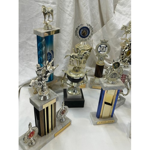 263 - Large selection of assorted Jockey/ cow boy trophies approximately 20 +