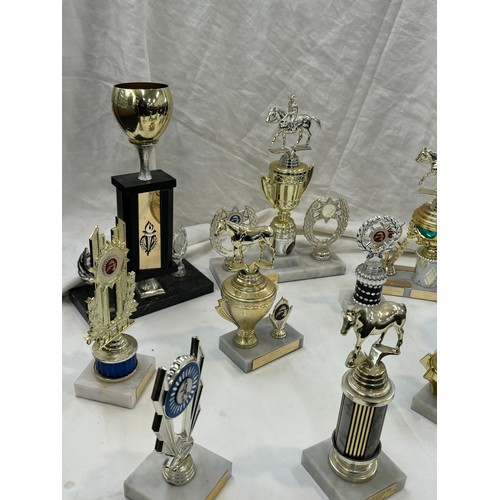 186 - Large selection of assorted Jockey/ cowboy  Trophies approximately 20 +