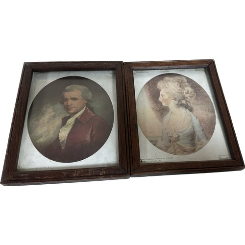 402 - Two oak framed pictures measures approximately 10.5 inches long by 8.5 wide