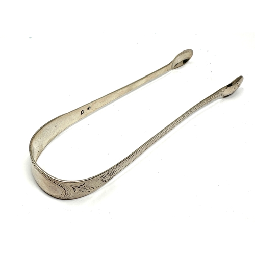 49 - Antique georgian bright cut silver sugar tongs weight 30g