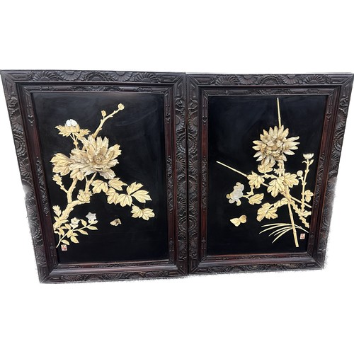 321 - Pair of oriental ebonised panels with lacquered bone and mother of pearl decoration both measure app... 