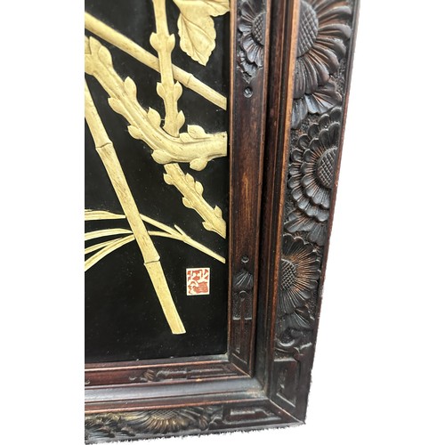 321 - Pair of oriental ebonised panels with lacquered bone and mother of pearl decoration both measure app... 