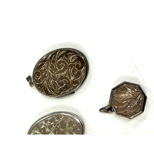 522 - Selection of 4 silver locket pendants