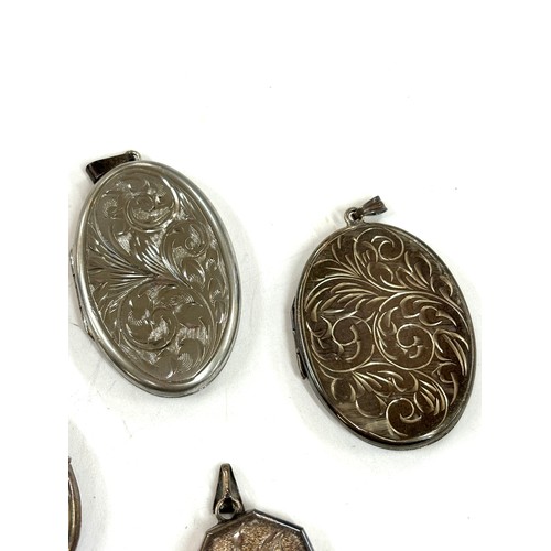 522 - Selection of 4 silver locket pendants