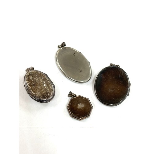 522 - Selection of 4 silver locket pendants