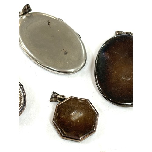 522 - Selection of 4 silver locket pendants