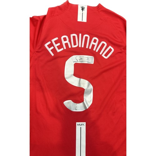 419 - Manchester United shirt signed by Rio Ferdinand
size small