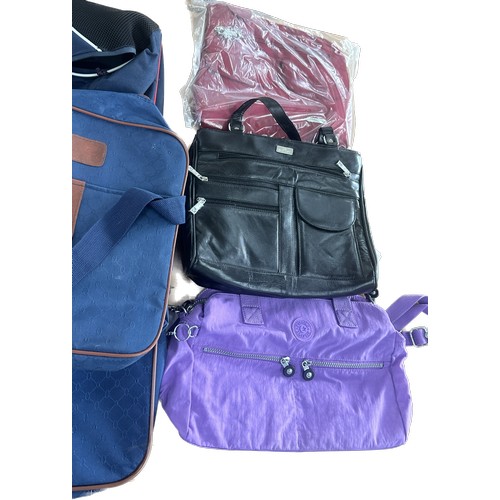 239 - Selection of brand new and some used assorted bags to include sports bags, hand bags etc