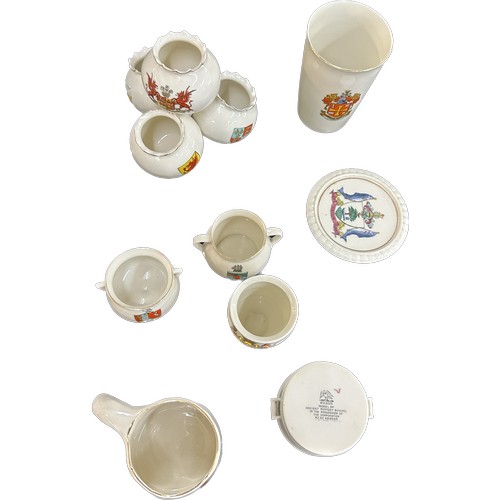 228 - Selection of vintage Goss crested china items to include cups, handled vases etc