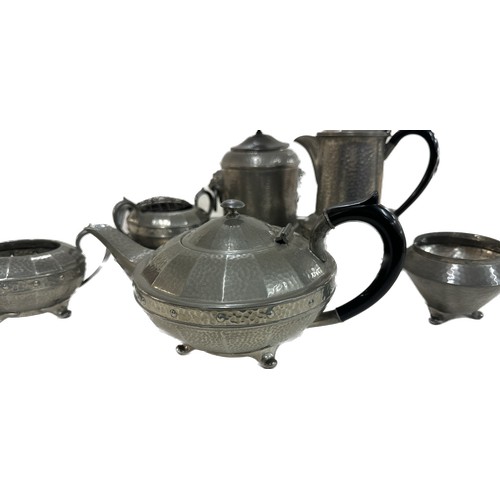 21 - Selection of vintage pewter ware to include lion detail lidded jar, a teapot, two handled sugar bowl... 