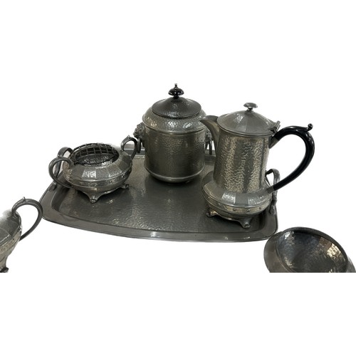 21 - Selection of vintage pewter ware to include lion detail lidded jar, a teapot, two handled sugar bowl... 