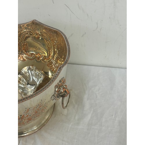 22 - Large antique silver on copper lion handled punch bowl and ladle measures approximately 8 inches tal... 