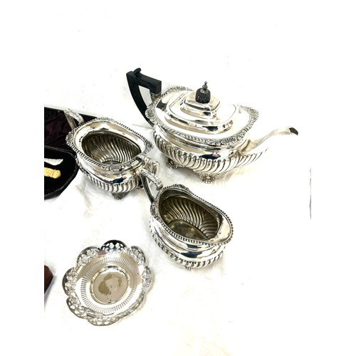 14 - Selection of silver plated items includes silver rimmed carving set etc