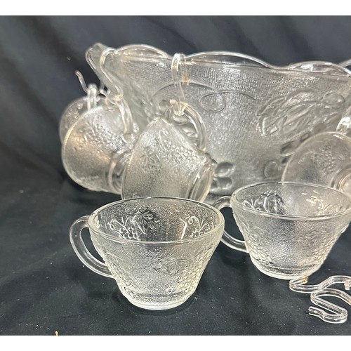 166 - Romance 26 piece punch bowl set to include bowl cups, plastic hooks and a ladle