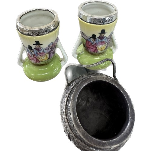 474 - Three hallmarked silver vases and a silver salt pot