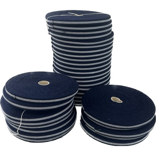 277 - Dealers lot - 33 rolls of 13mm wide navy blue and white service lace.  Each roll is 33 metres long