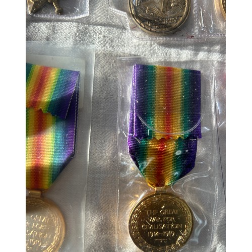 564 - 14 High Quality Copy Full Size medals.  5 Victory Medals, 5 1945-15 Stars, 1 Mercantile Marine and 3... 