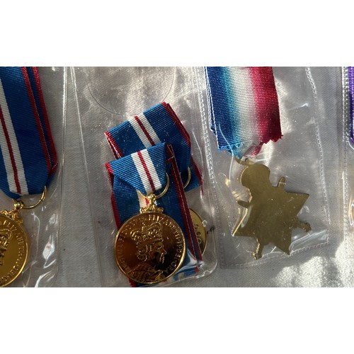 564 - 14 High Quality Copy Full Size medals.  5 Victory Medals, 5 1945-15 Stars, 1 Mercantile Marine and 3... 