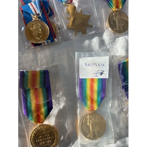 564 - 14 High Quality Copy Full Size medals.  5 Victory Medals, 5 1945-15 Stars, 1 Mercantile Marine and 3... 