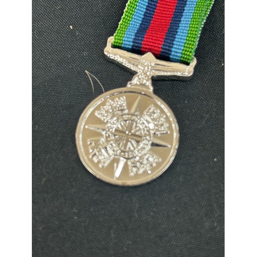 559 - Dealers lot - 50 miniature Operational Service medals.