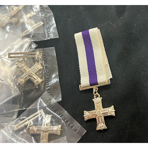 566 - Dealers lot - 50 miniature Military Cross Geo VI medals.