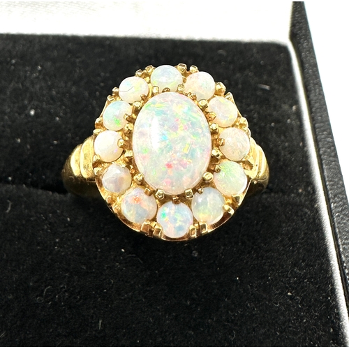 398 - 18ct gold opal ring weight 3.8g