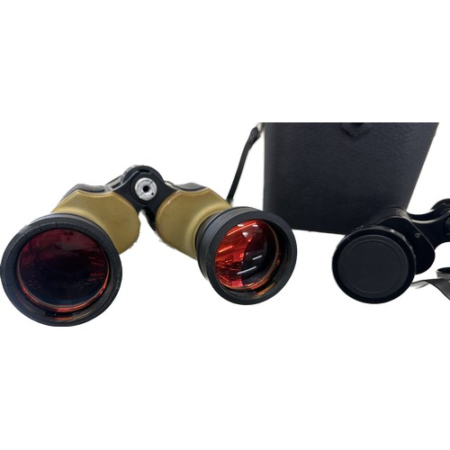 59 - Two binoculars a Tobishika 10 x 50 multi coated optics 9mm/1000m and a pair of ELC's, untested