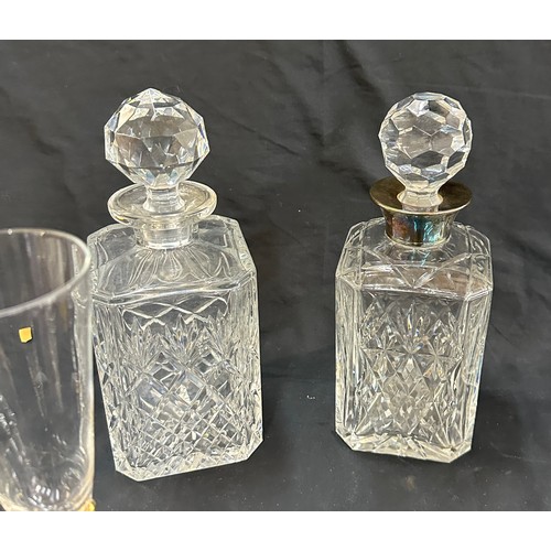 129 - Selection of vintage glass decanters and a set of 8 champayne glasses