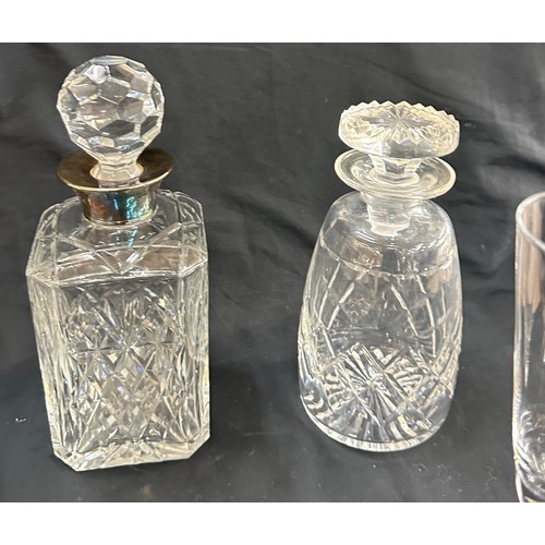 129 - Selection of vintage glass decanters and a set of 8 champayne glasses