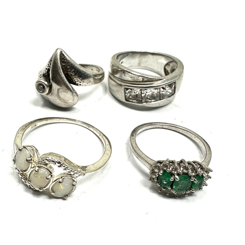 189 - 4 vintage silver stone set rings
