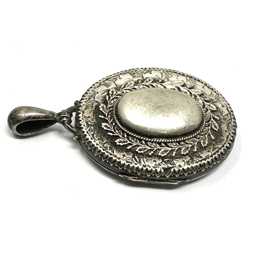 205 - Large antique silver locket measures approx 6cm drop xrt as silver