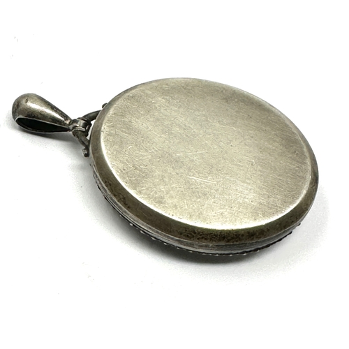205 - Large antique silver locket measures approx 6cm drop xrt as silver