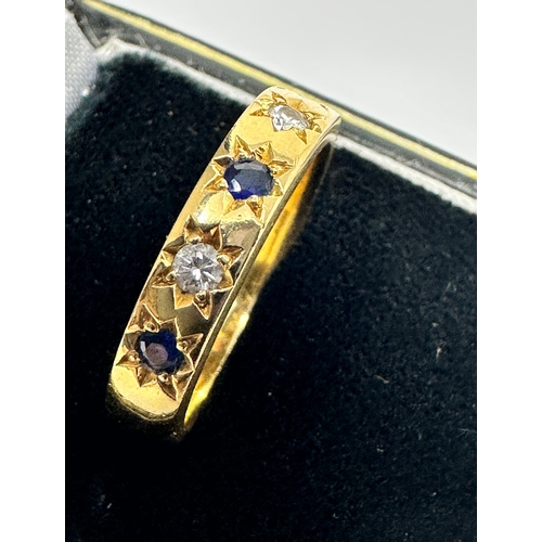 491 - 18 ct gold diamond & sapphire ring weight 6.3g