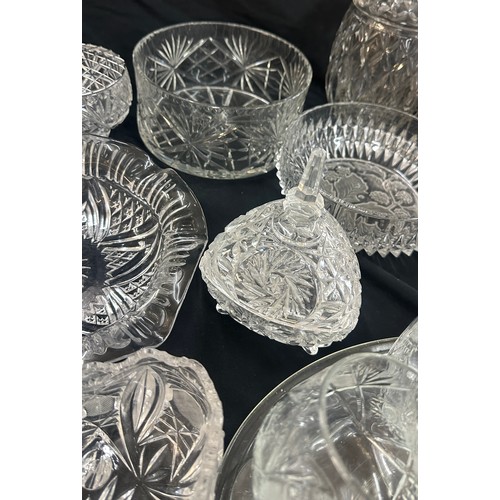 134 - Large selection of assorted glassware to include decorative crystal pieces, jars, bowls, trinkets, c... 