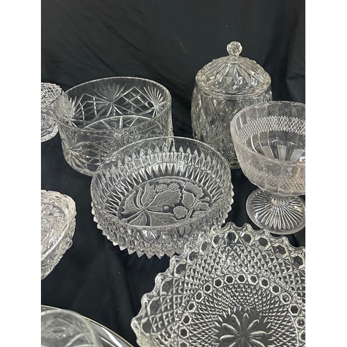 134 - Large selection of assorted glassware to include decorative crystal pieces, jars, bowls, trinkets, c... 