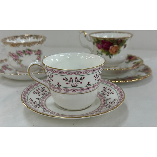 76 - Three vintage cup and saucer sets ' Royal Crown Derby Brittany', ' Royal Albert Old Country Rose' an... 