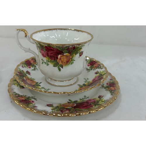 76 - Three vintage cup and saucer sets ' Royal Crown Derby Brittany', ' Royal Albert Old Country Rose' an... 